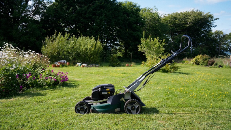 Lawn Mower on Green Grass